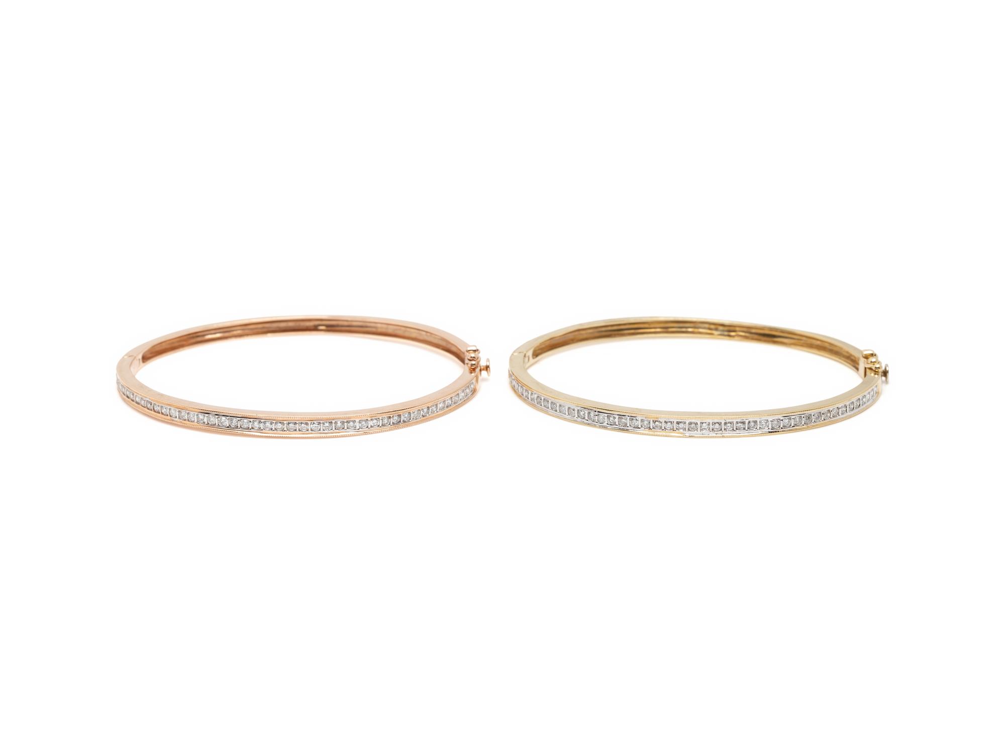 PAIR OF GOLD AND DIAMOND BANGLES