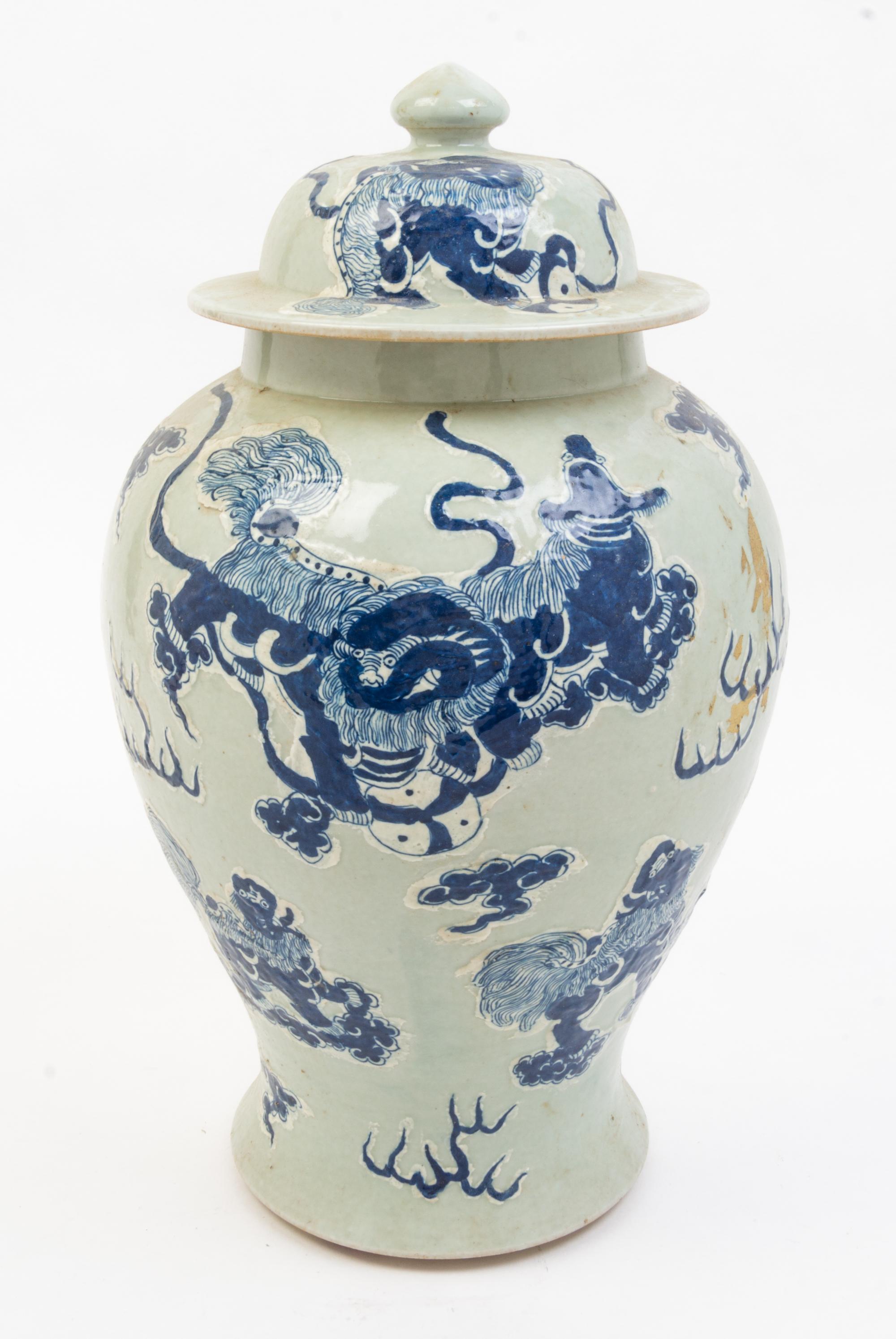 A Pair of Blue and White Porcelain Jars and Covers Height 17 1/2 inches.