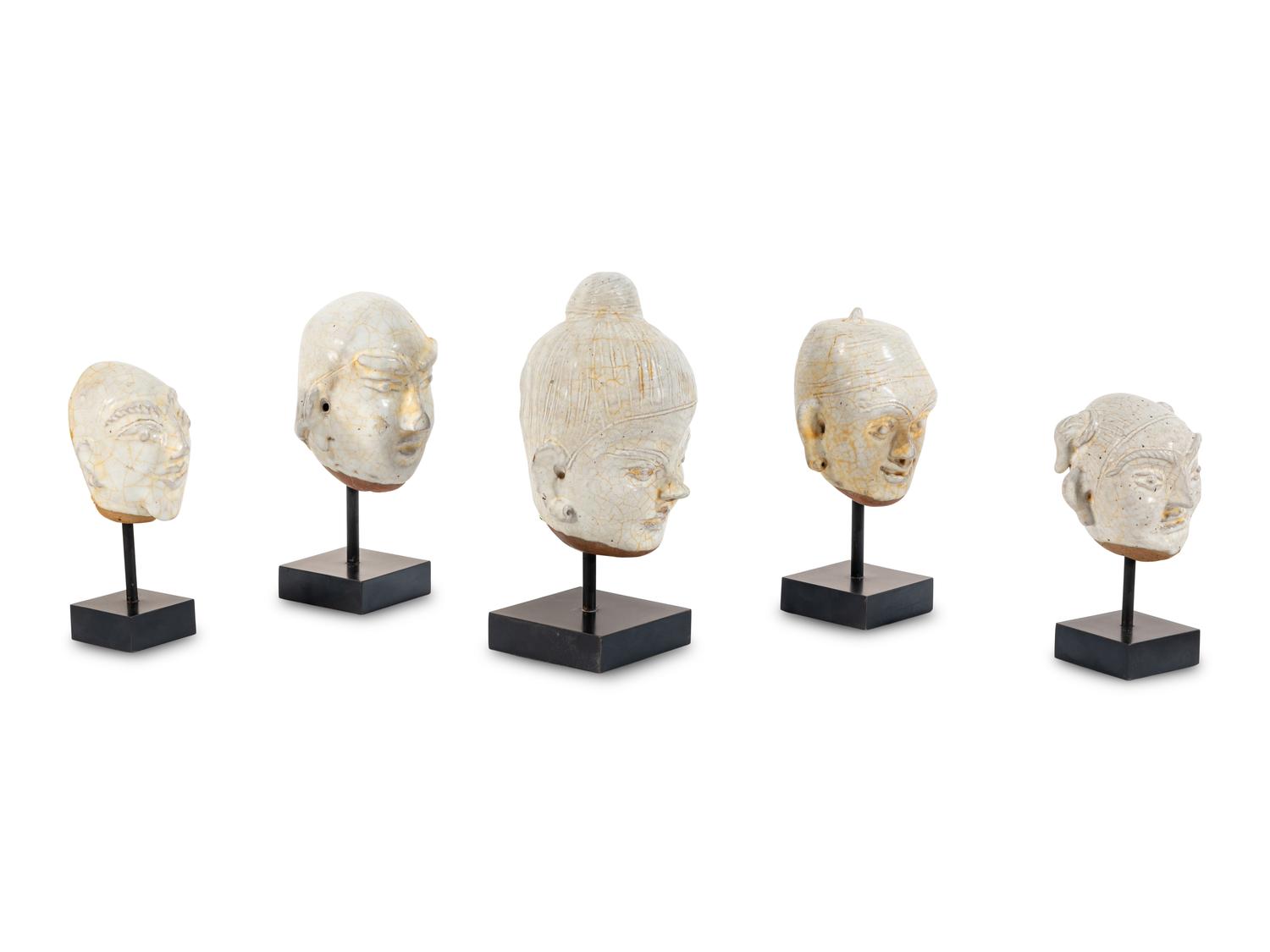 Five Glazed Earthenware Deity Heads