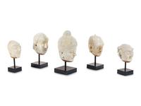 Five Glazed Earthenware Deity Heads