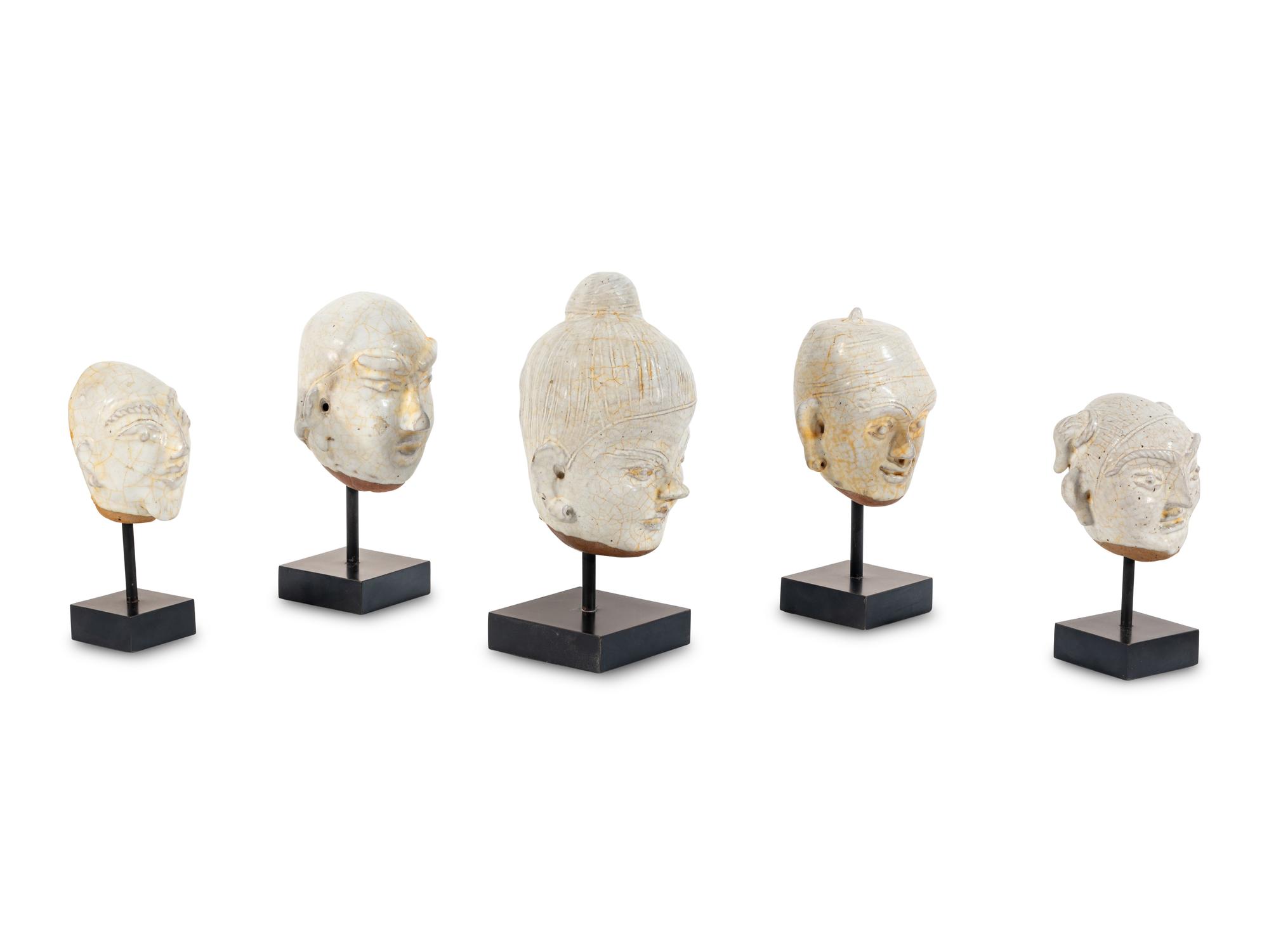 Five Glazed Earthenware Deity Heads