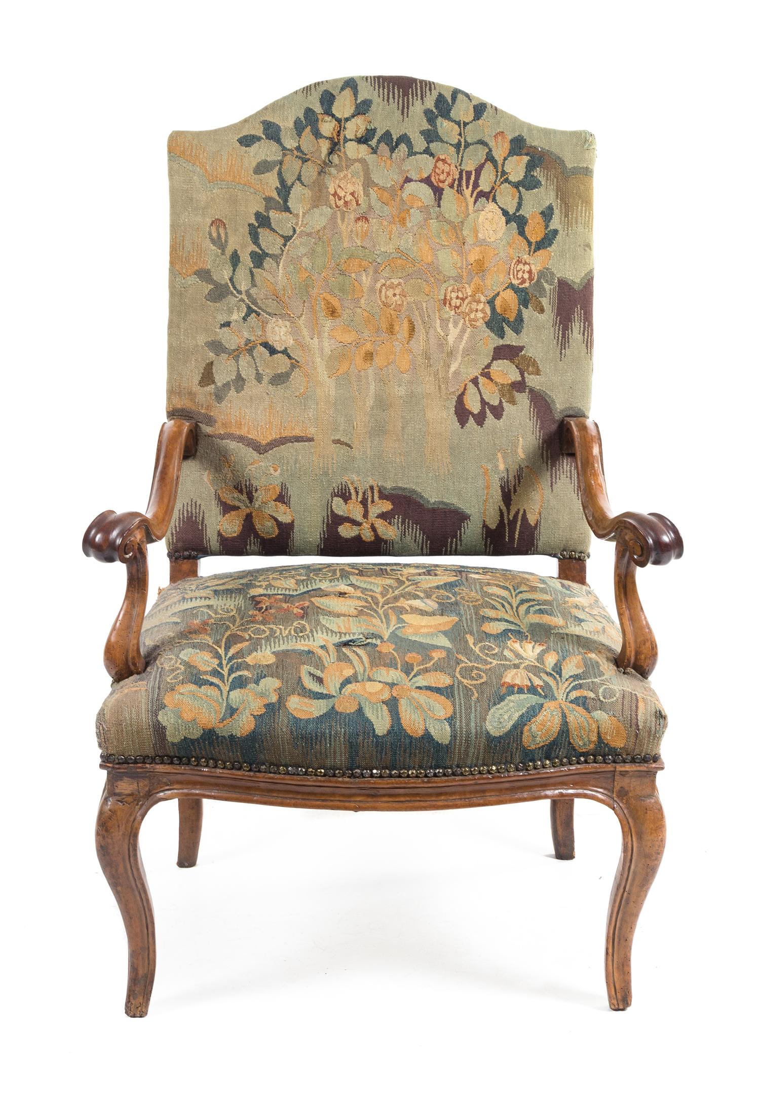 A Regence Walnut Armchair Height 44 1/4 inches. — 18TH CENTURY