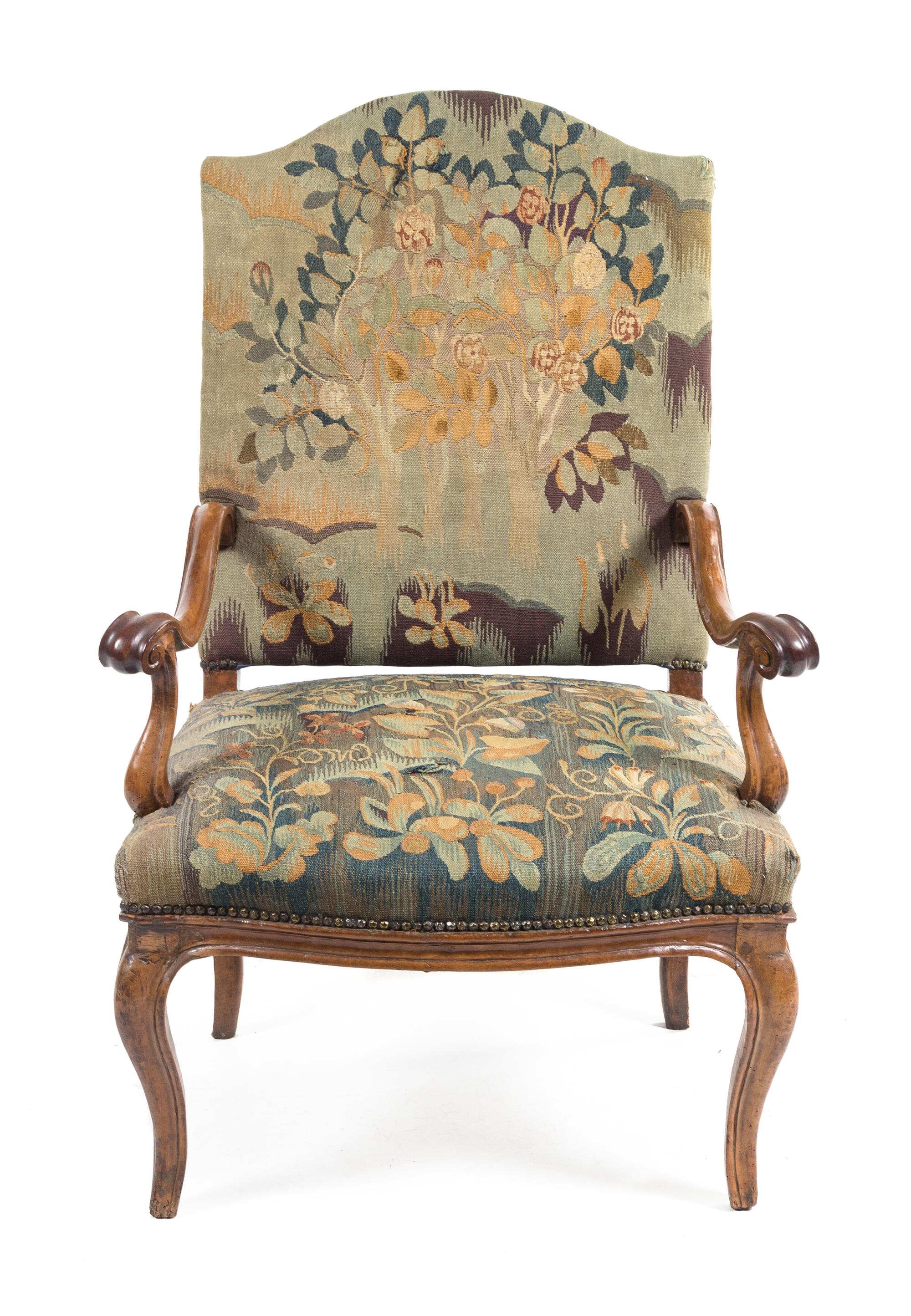 A Regence Walnut Armchair Height 44 1/4 inches. — 18TH CENTURY
