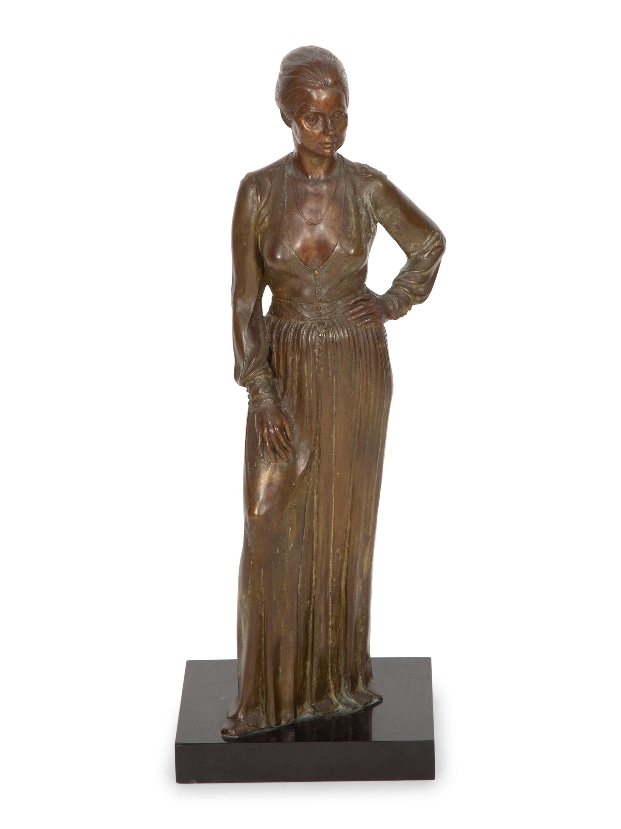 A Bronze Sculpture of a Standing Woman