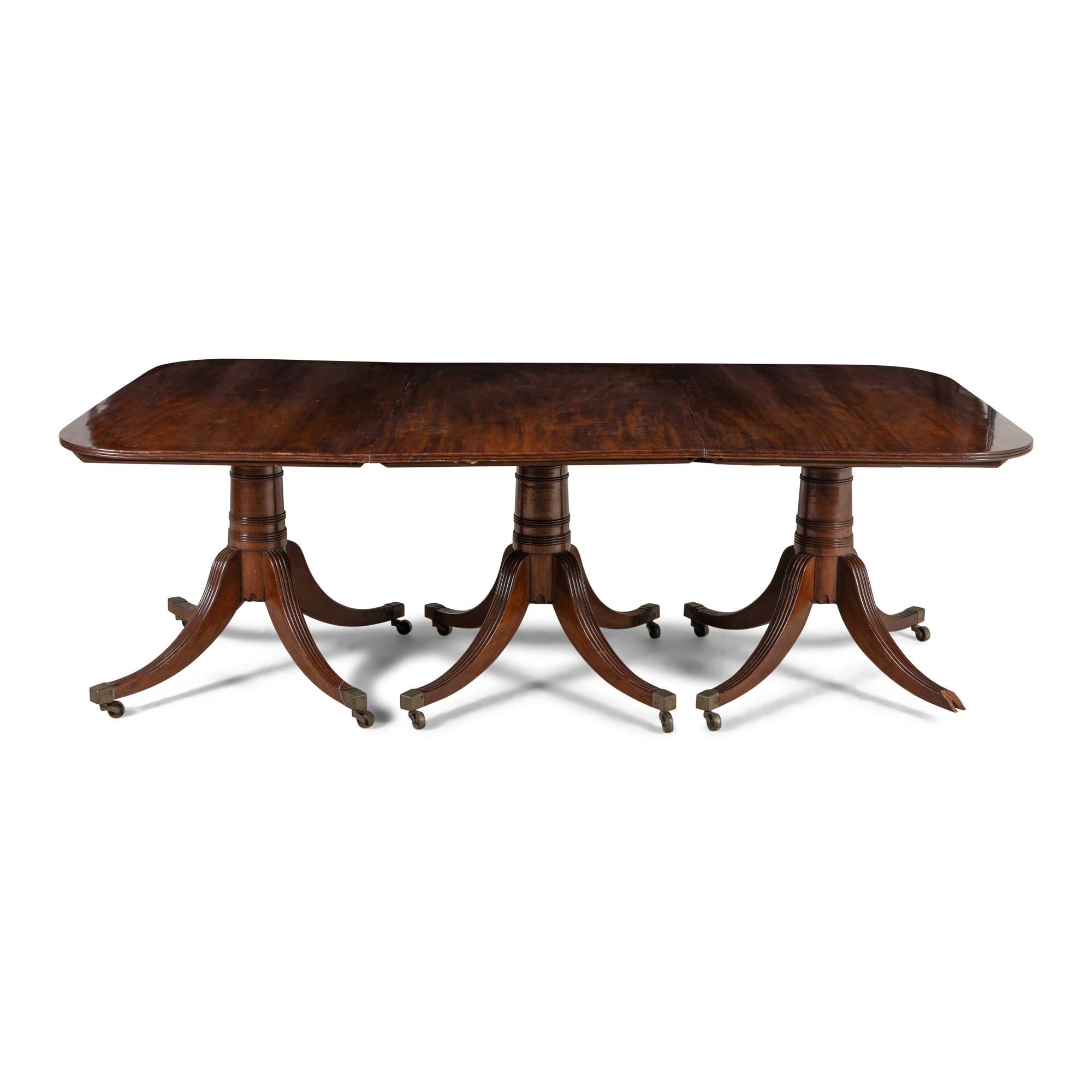 A Late George III Mahogany Triple Pedestal Dining Table