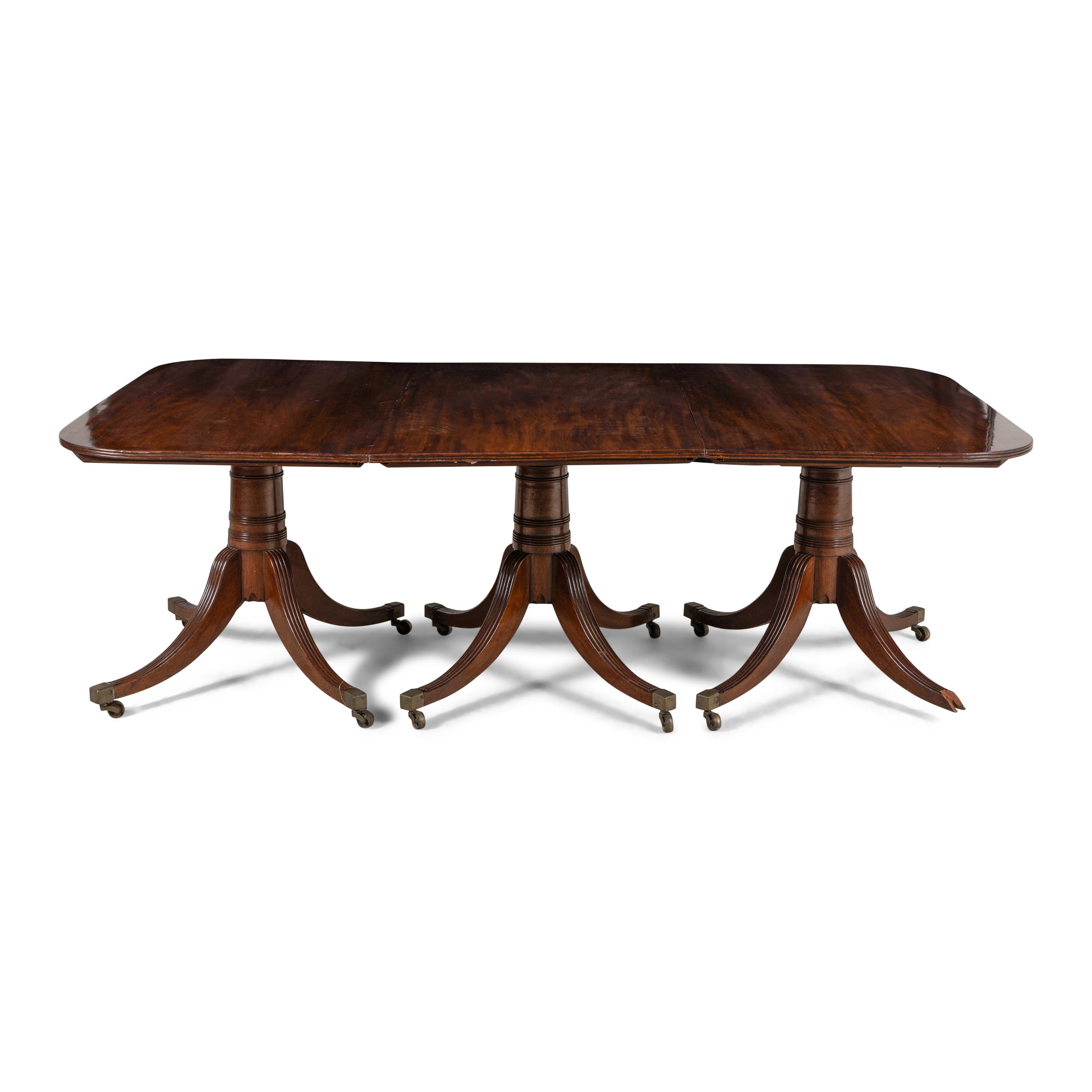 A Late George III Mahogany Triple Pedestal Dining Table