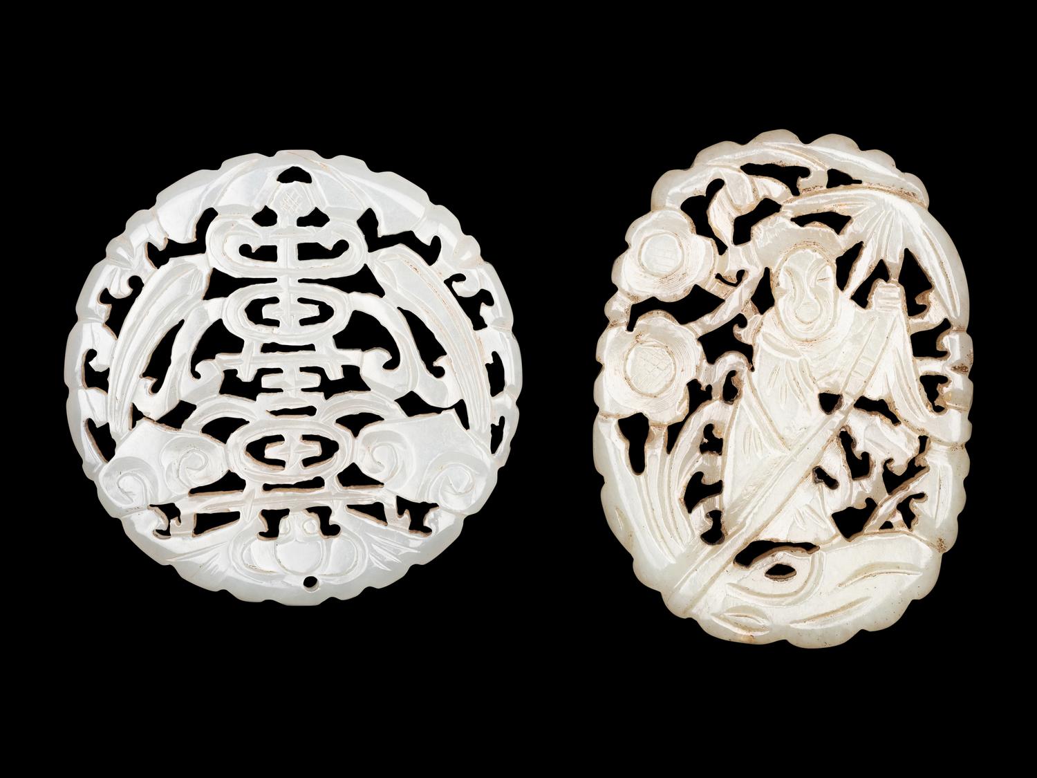 Two Chinese Pale Celadon Jade Reticulated Pendants