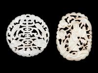 Two Chinese Pale Celadon Jade Reticulated Pendants