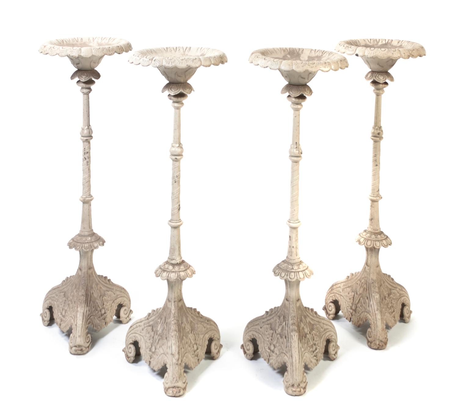 A Set of Four Victorian Cast Iron Pricket Sticks, Height 42 1/2 inches.
