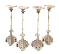 A Set of Four Victorian Cast Iron Pricket Sticks, Height 42 1/2 inches.