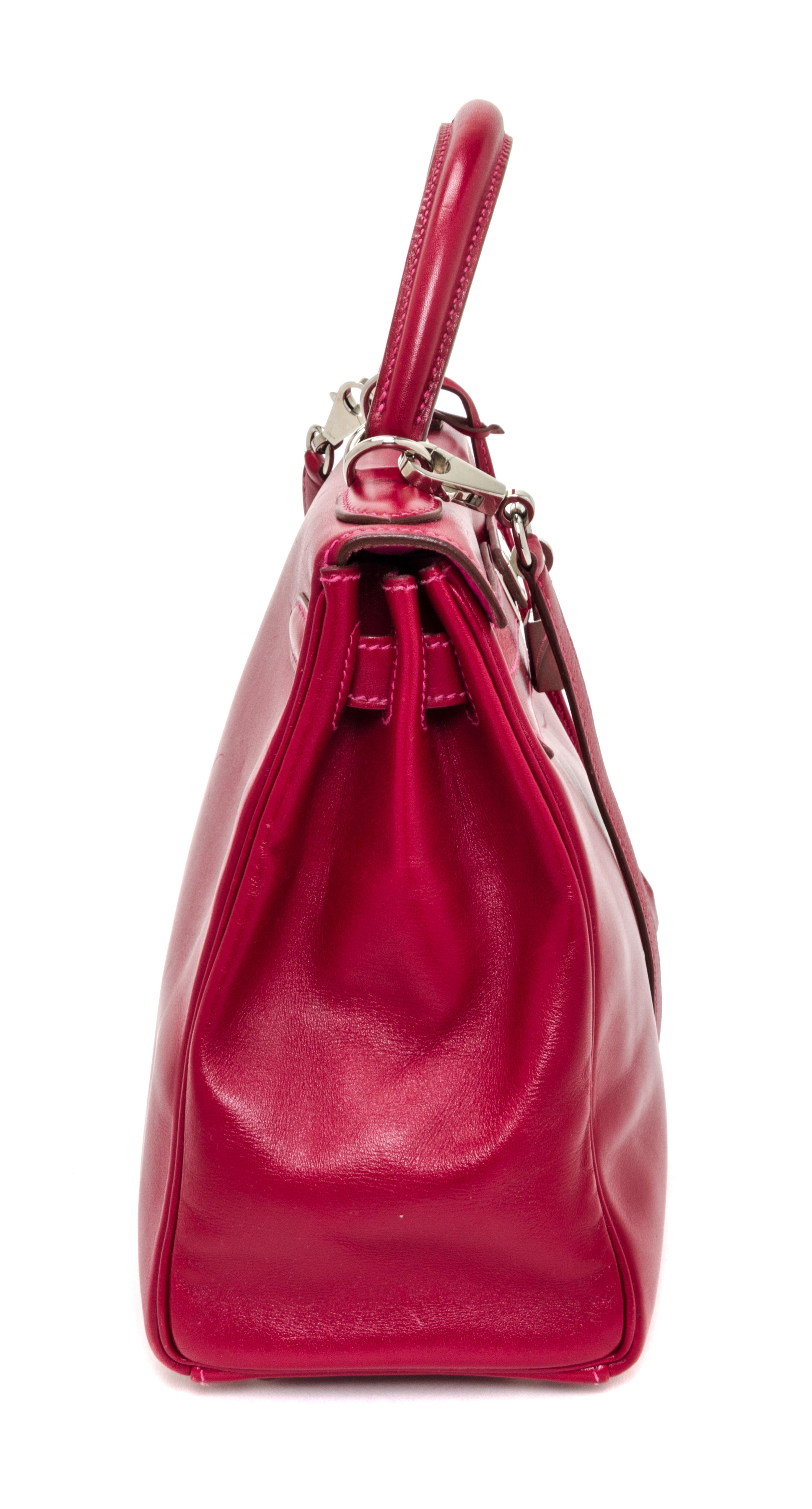 An Hermes Rubis and Rose Tyrien Candy Tadelakt and Chevre Retorne 28cm Kelly Handbag, 11" x 8.5" x 4".