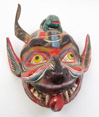 Five Mexican Painted Masks Height of largest 25 inches.