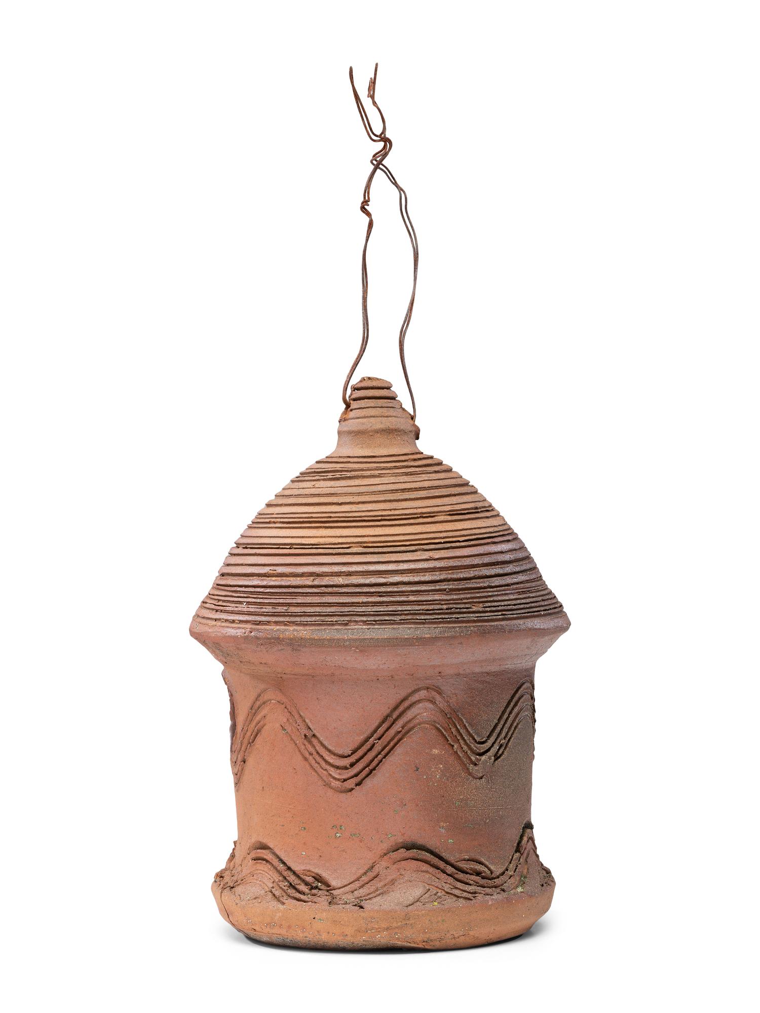 An Incised Sewer Tile Birdhouse