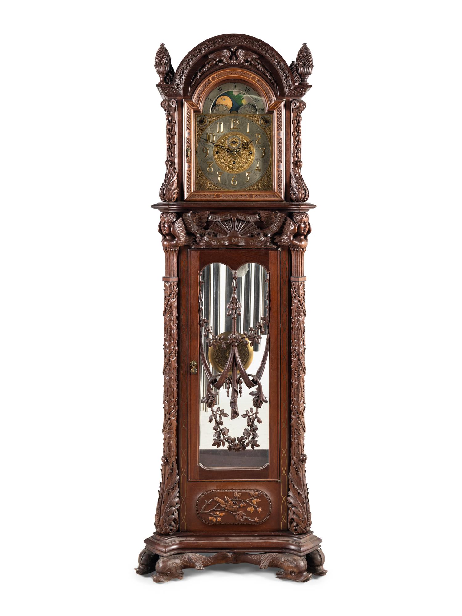 A Renaissance Revival Carved Mahogany Tube-Striking Tall Case Clock