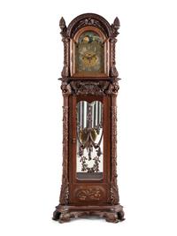 A Renaissance Revival Carved Mahogany Tube-Striking Tall Case Clock