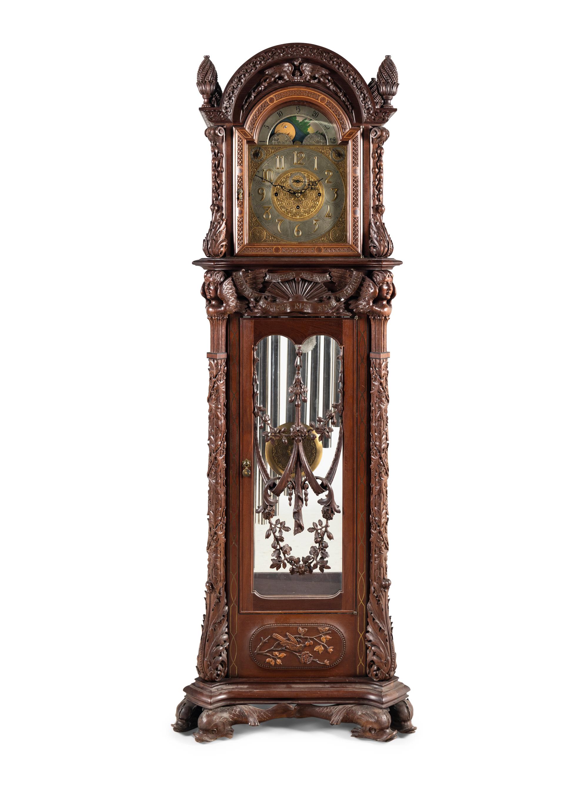 A Renaissance Revival Carved Mahogany Tube-Striking Tall Case Clock