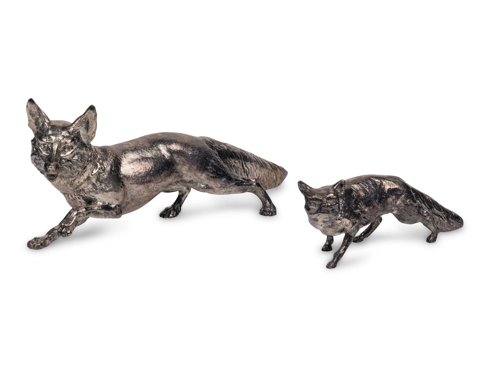 A Pair of Silver Fox-Form Table Ornaments