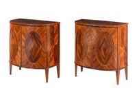 A Pair of George III Goncalo Alves Demilune Cabinets