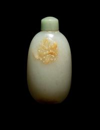 A Chinese Carved Russet and Pale Celadon Jade Oval-Form 'Butterflies' Snuff Bottle