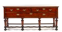 An English Burlwood Sideboard, Height 32 1/4 x width 71 3/4 x depth 22 1/2 inches.