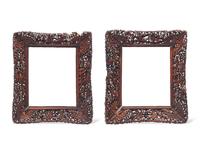 A pair of Chinese Export carved and stained wood frames, 19th century