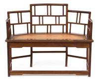 A Chinese Hardwood and Rattan Bench Height 34 x width 44 x depth 20 inches. — 19TH CENTURY