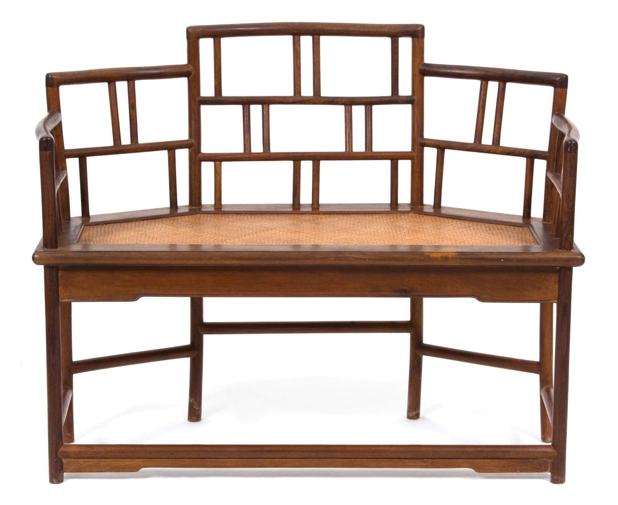 A Chinese Hardwood and Rattan Bench Height 34 x width 44 x depth 20 inches. — 19TH CENTURY
