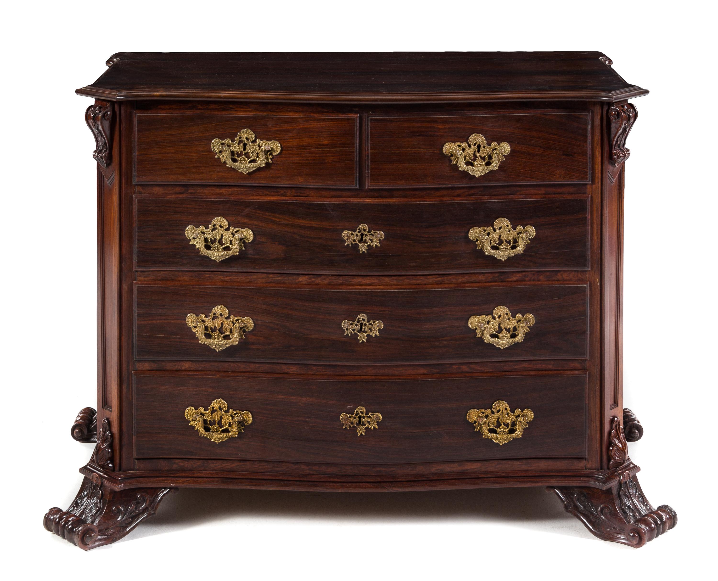 A Continental Rosewood Chest of Drawers Height 35 x width 45 x depth 23 1/4 inches. — 20TH CENTURY