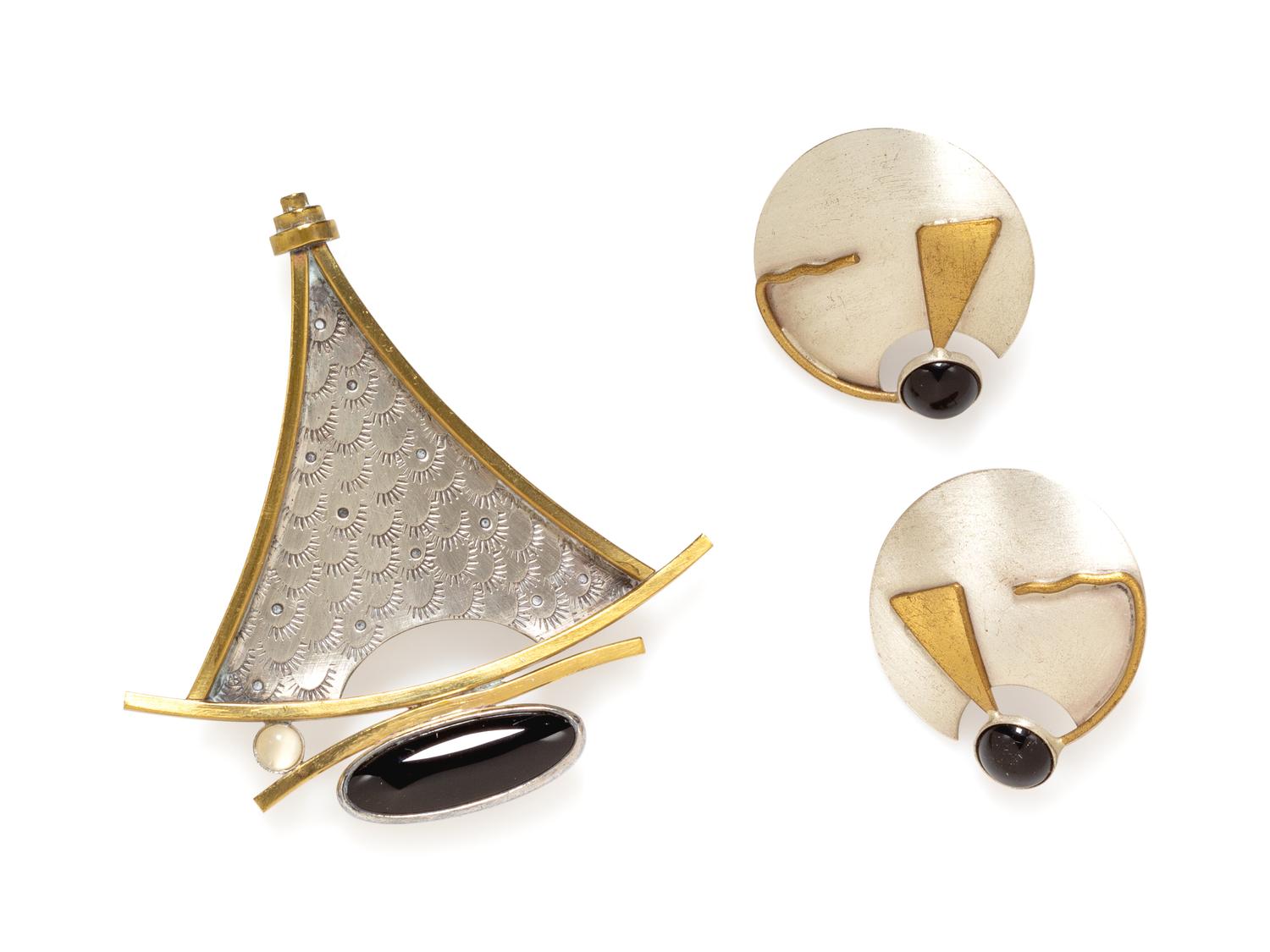 A Collection of Silver, Brass and Onyx Jewelry,