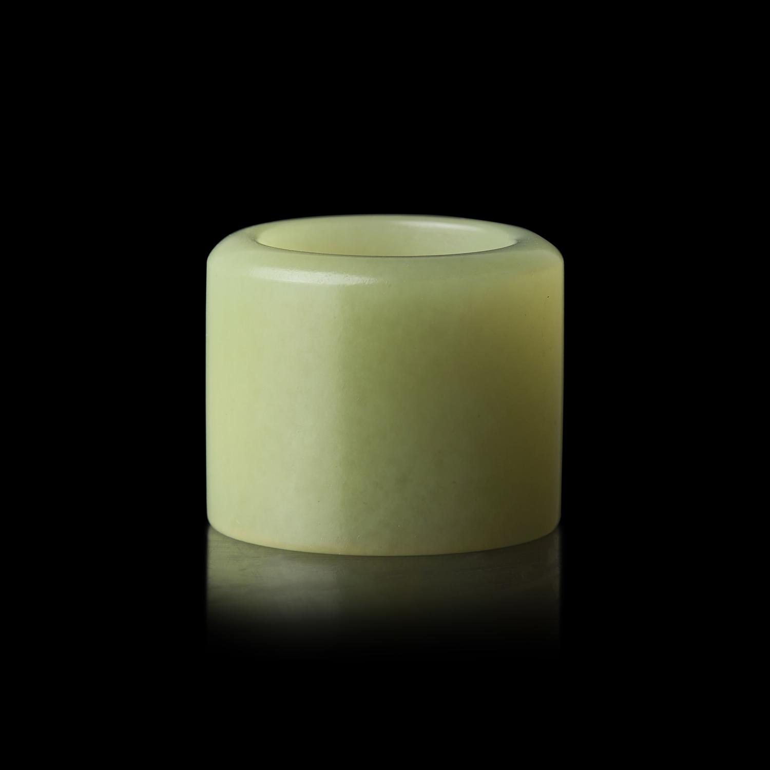 A Chinese Yellow Jade Archer's Ring, 18th/19th Century 清中期 黃玉素面扳指