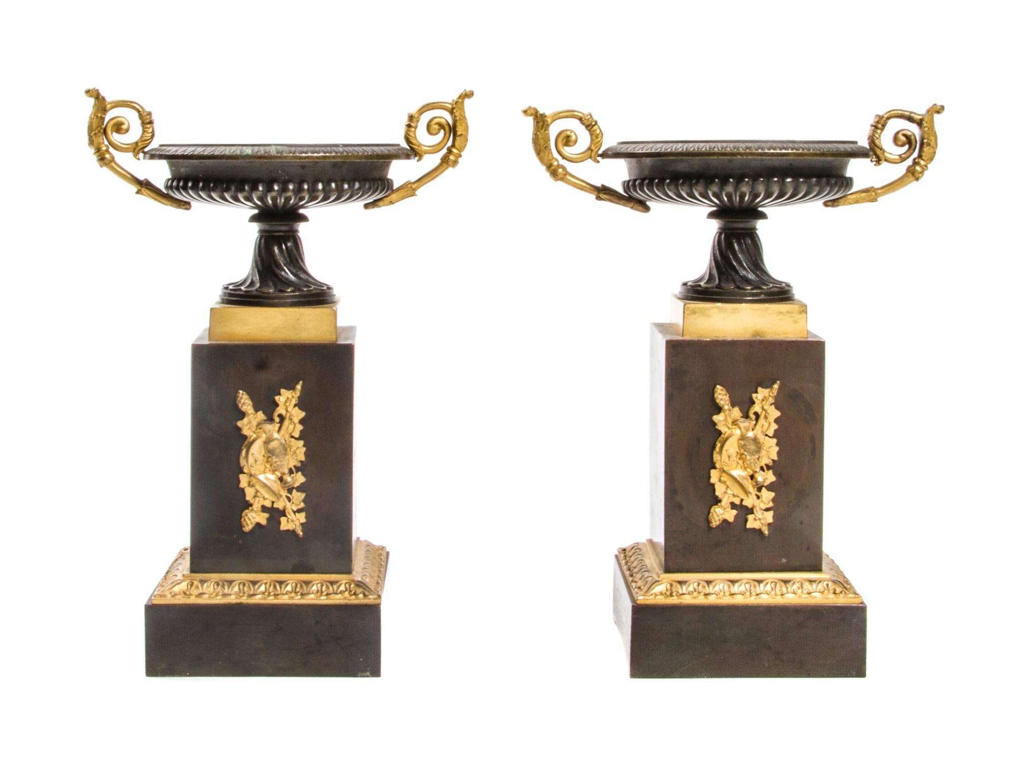 A Pair of Empire Patinated and Gilt Bronze Tazze, Height 9 1/2 inches.