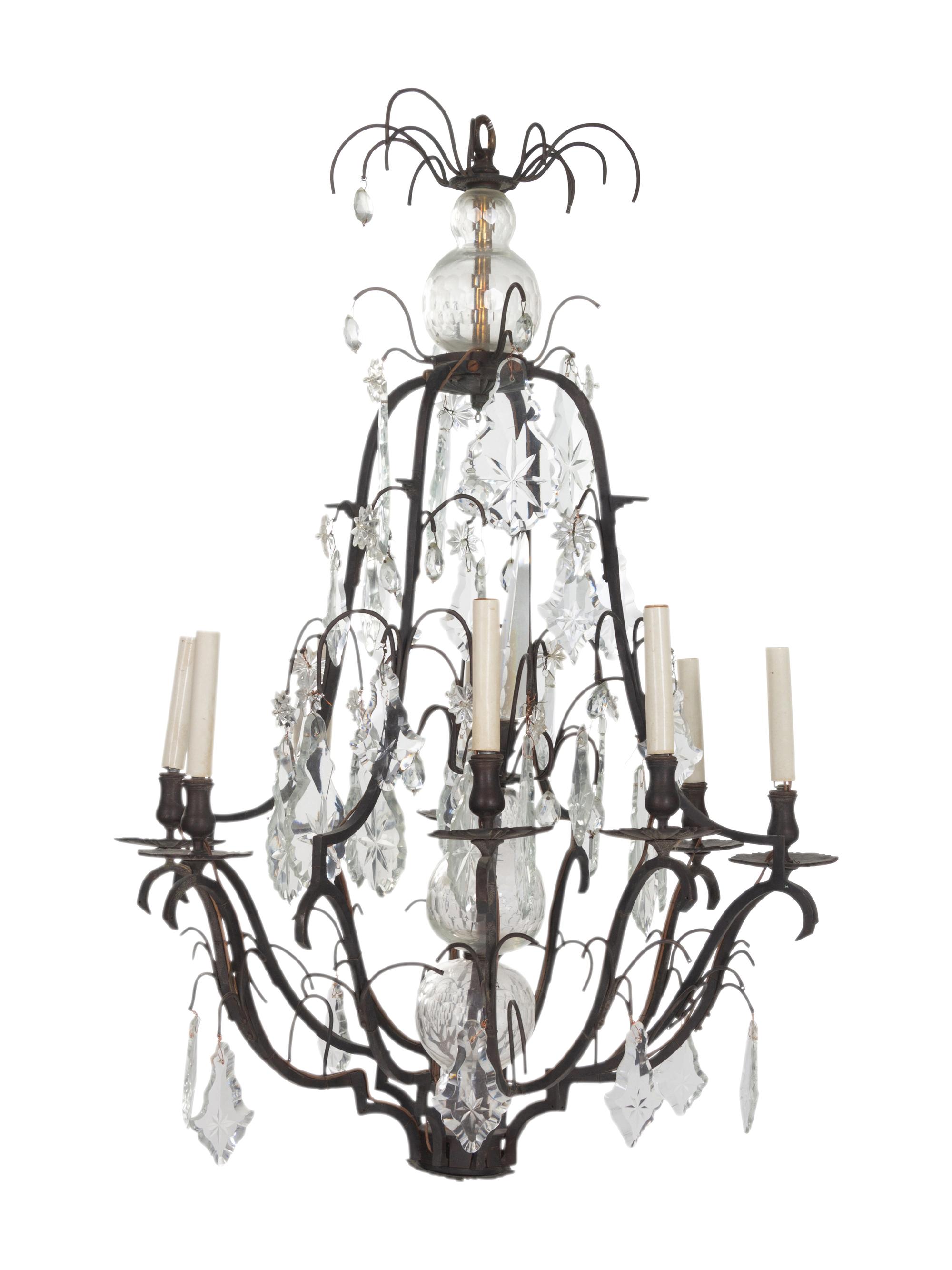 A Continental Cast Metal and Cut Glass Eight-Light Chandelier