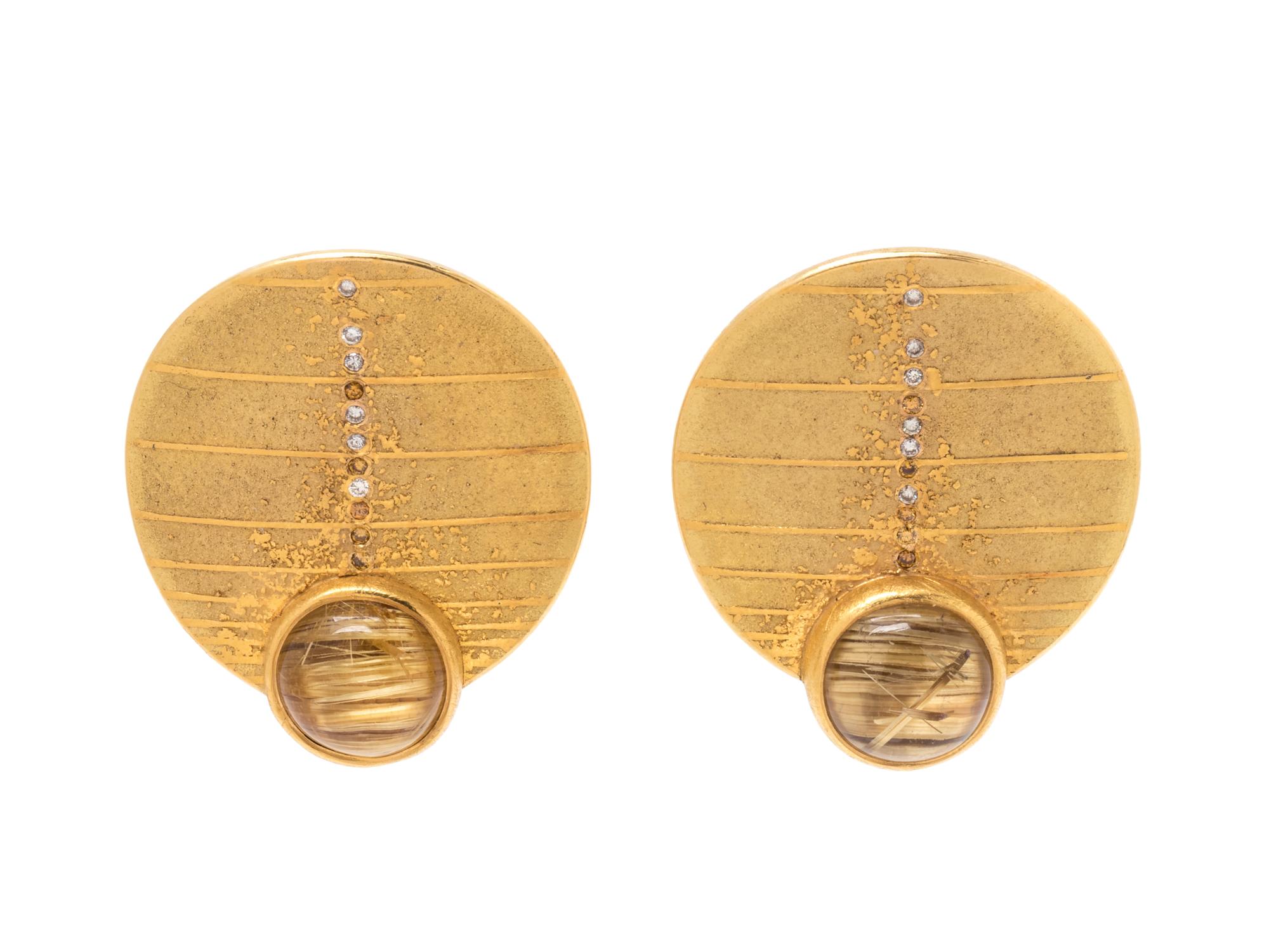 A Pair of 18 Karat Yellow Gold, Quartz, Diamond and Colored Diamond Earclips,