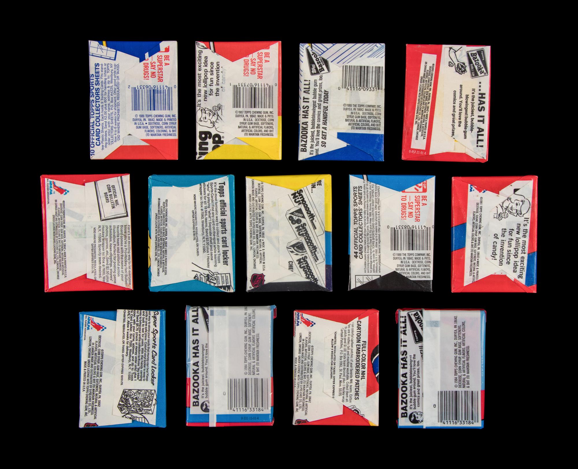 A Collection of 1974-90 Topps Hockey Sealed Wax Packs