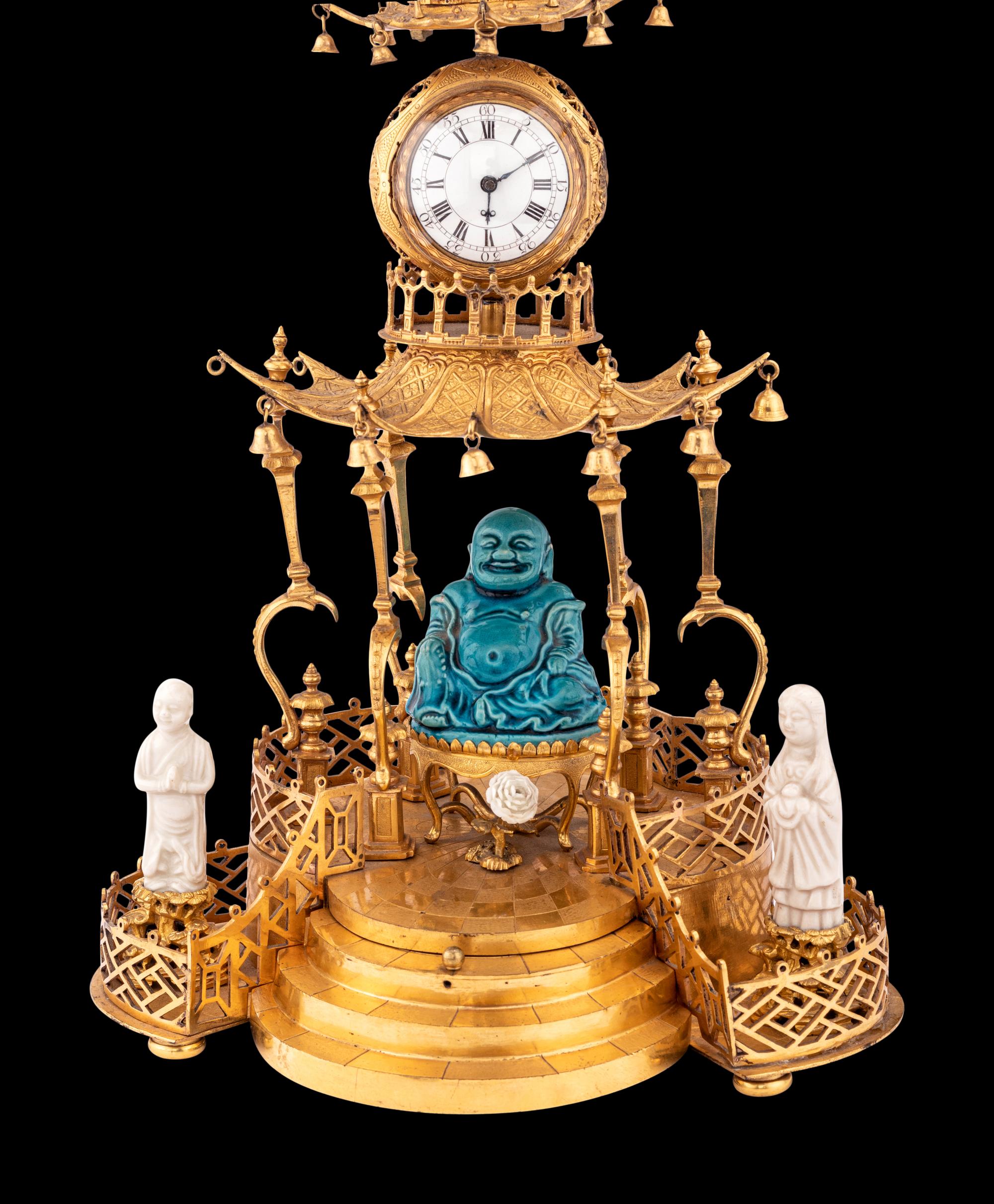 A Louis XV Style Gilt Bronze and Chinese Porcelain Mounted Pagoda-Form Mantel Clock