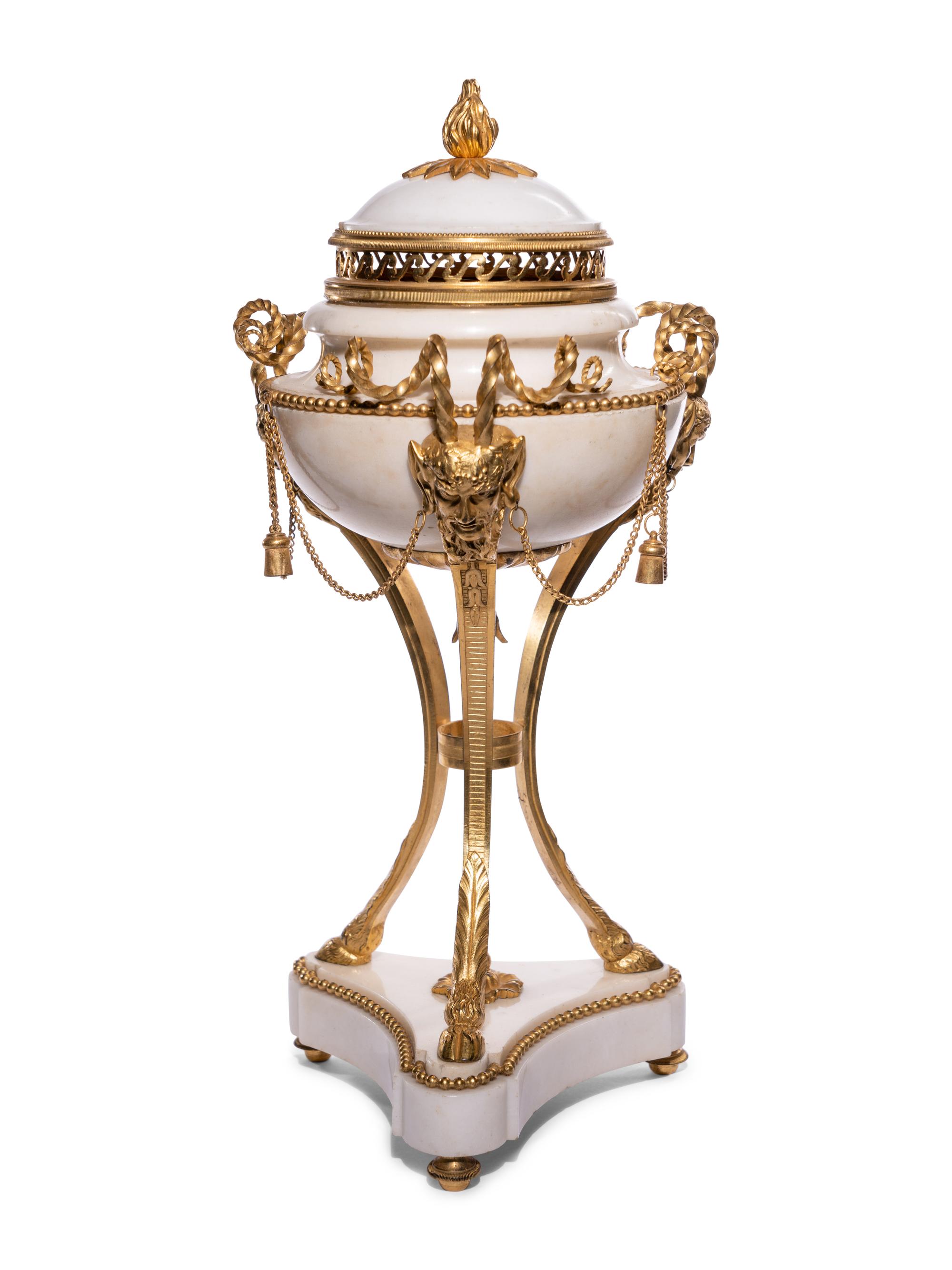 A Pair of Late Louis XVI Gilt Bronze Mounted White Marble Cassolettes
