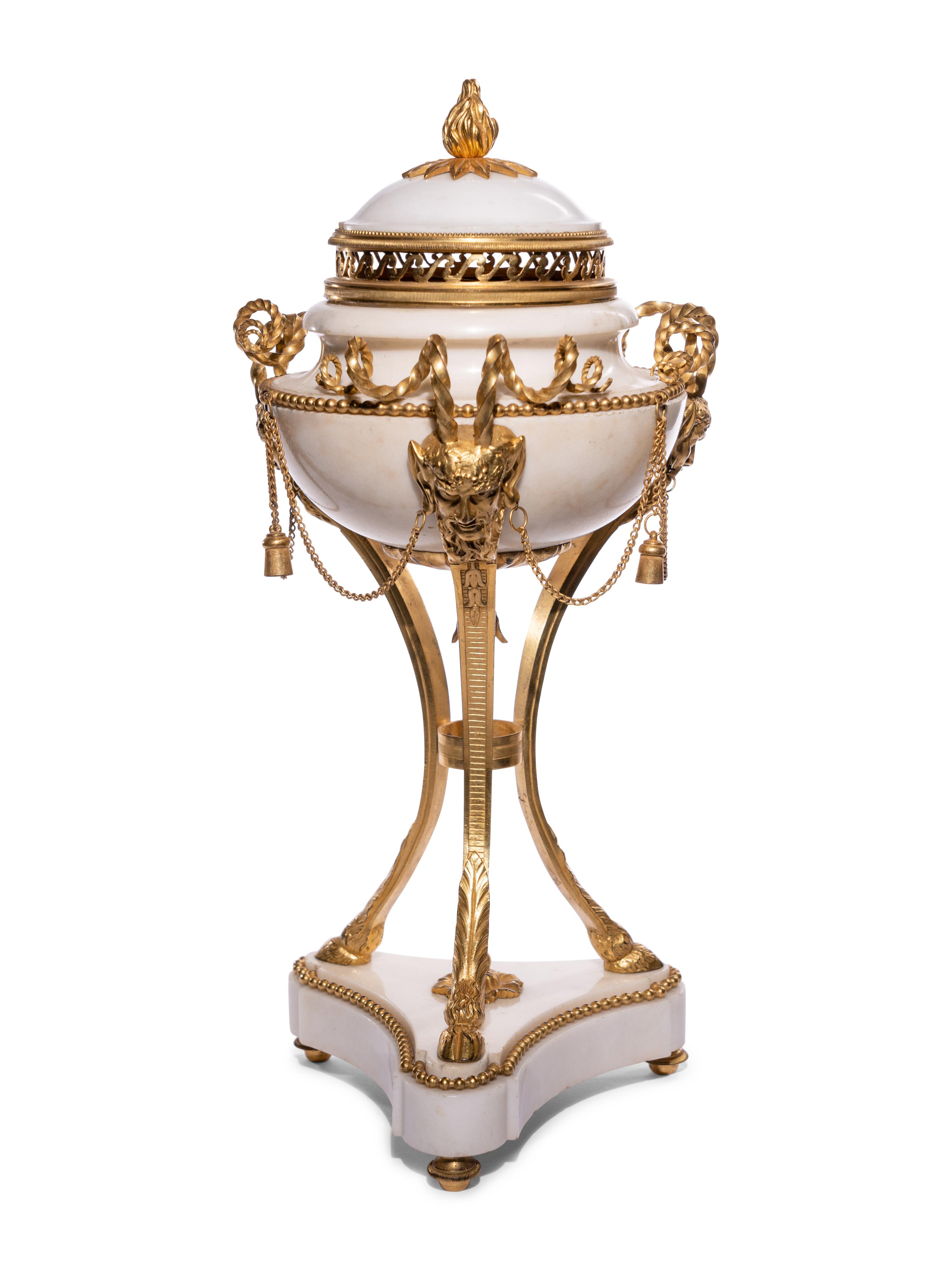 A Pair of Late Louis XVI Gilt Bronze Mounted White Marble Cassolettes