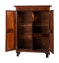 A Classical Carved and Highly Figured Mahogany Wardrobe