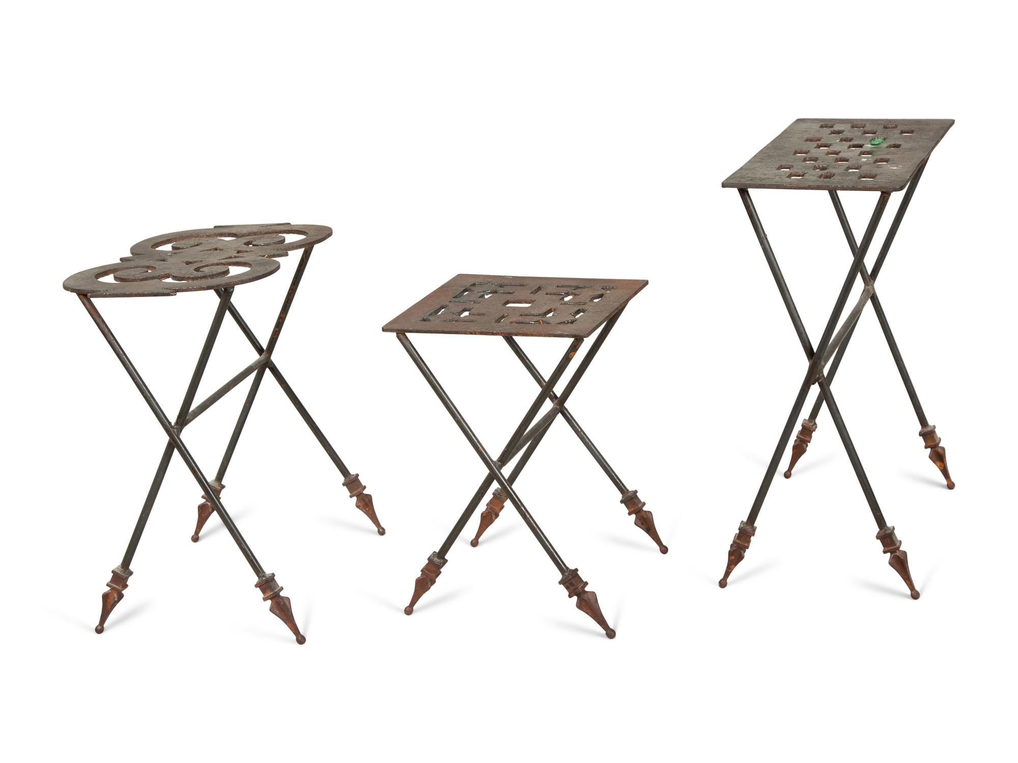 A Set of Three Cut-Out Metal Nesting Tables