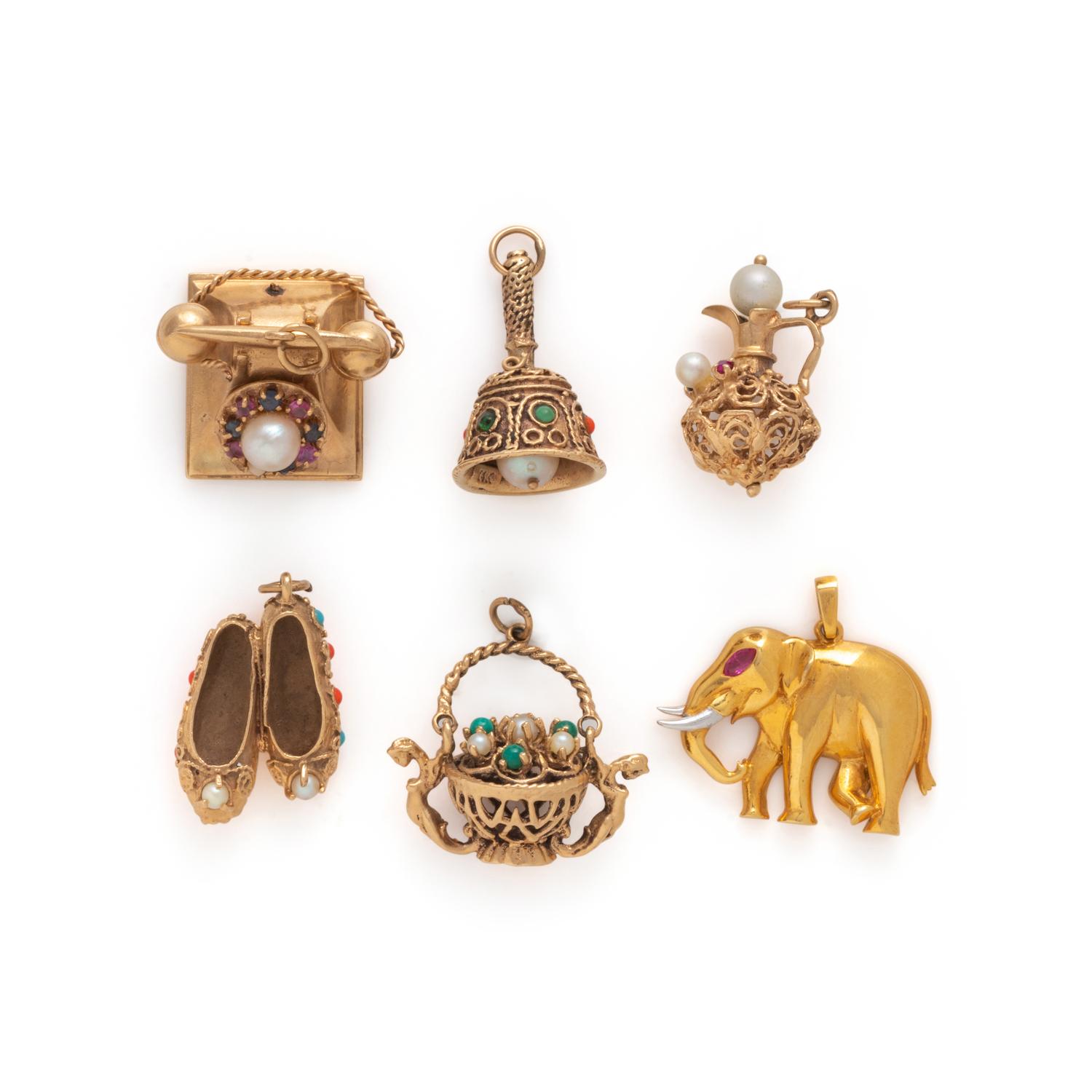 COLLECTION OF YELLOW GOLD AND GEMSTONE CHARMS