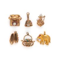 COLLECTION OF YELLOW GOLD AND GEMSTONE CHARMS