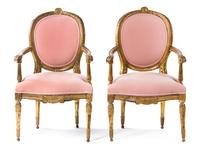 A Pair of Louis XVI Style Giltwood Fauteuils Height 39 1/2 inches. — 19TH CENTURY