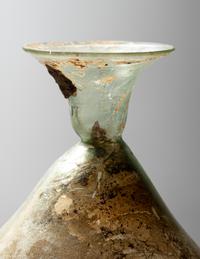 A Roman Green Glass Beaker