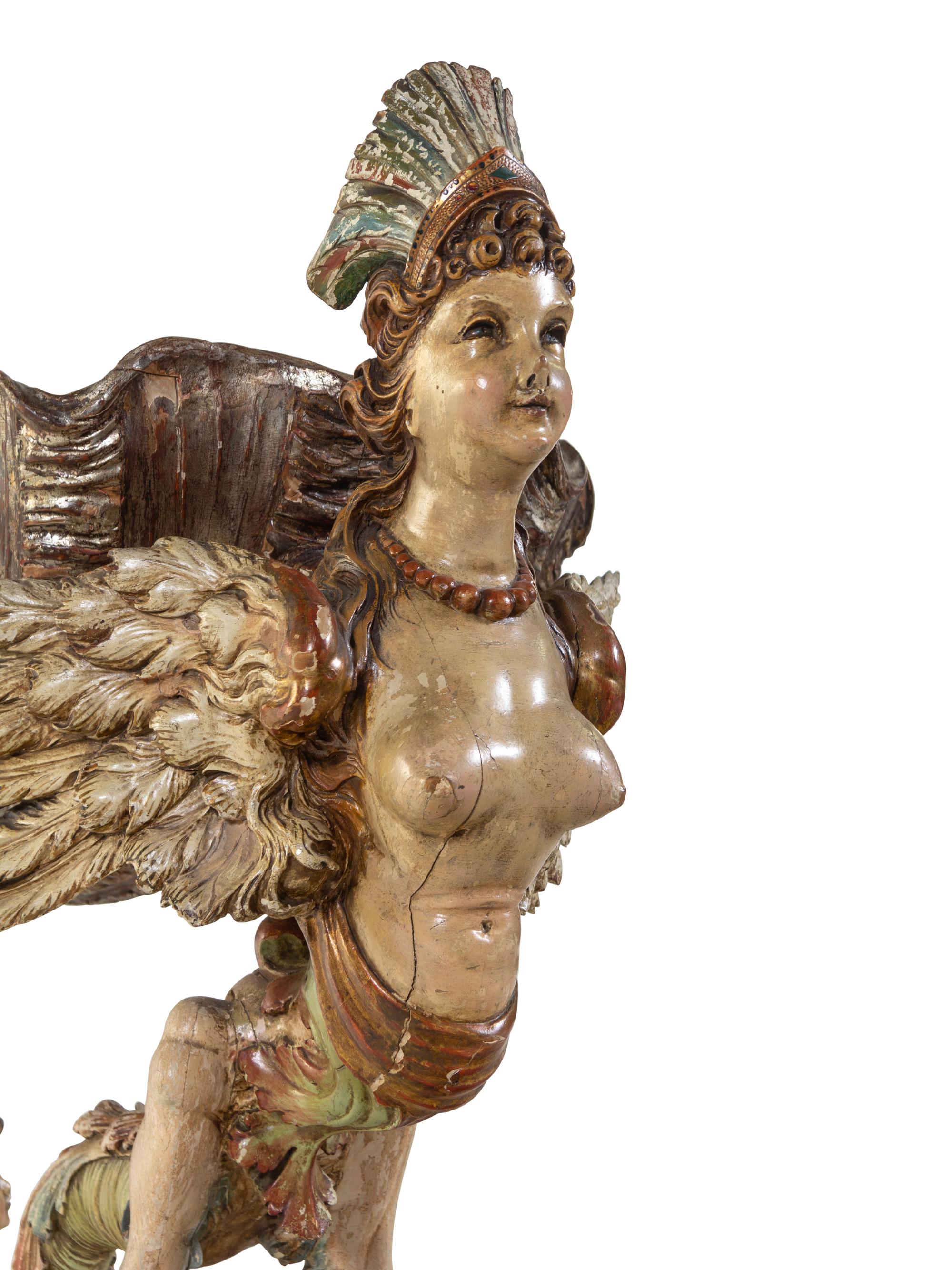 A Venetian Figural Carved and Polychrome Decorated Wood Cradle