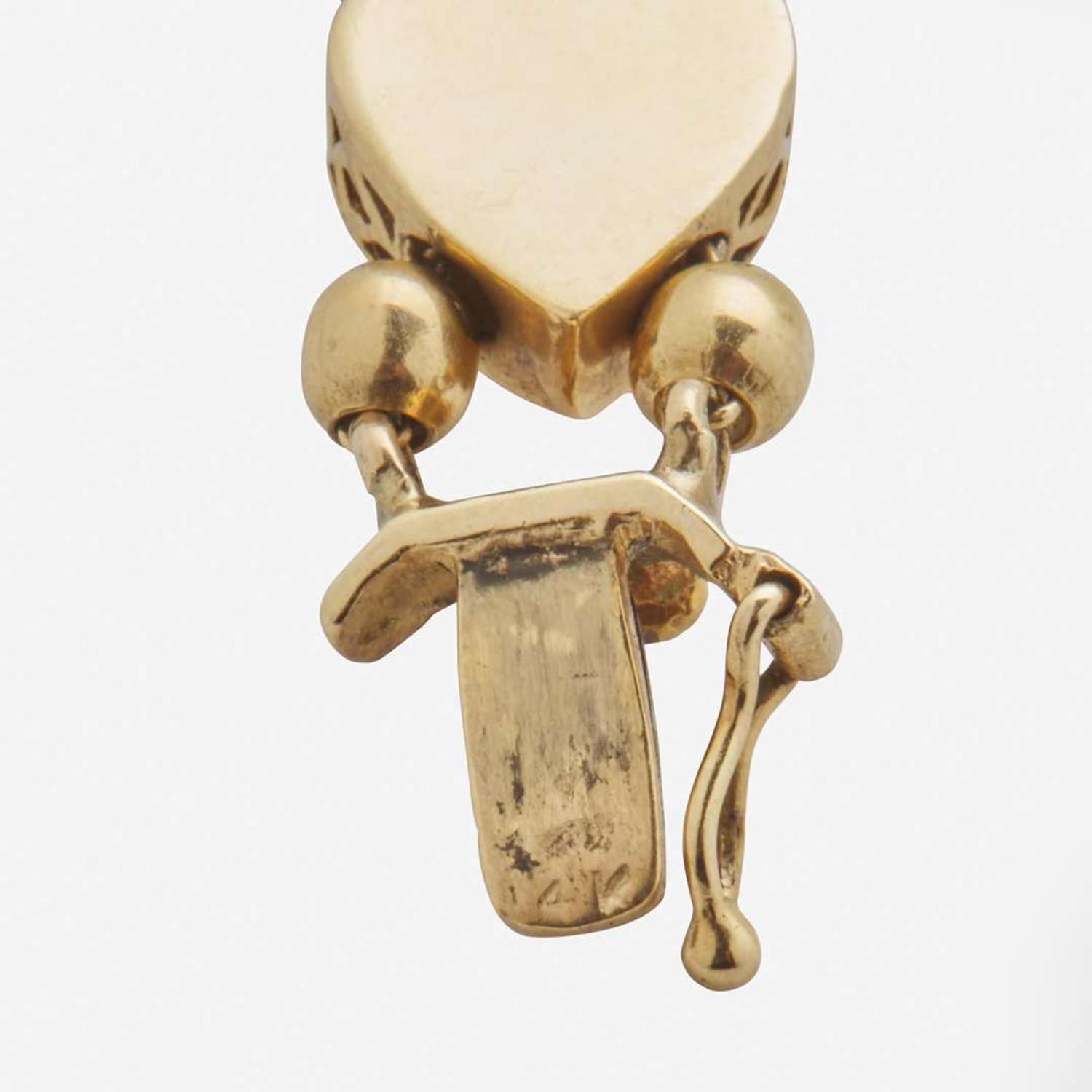 A 14K Yellow Gold Vintage Slide Charm Bracelet