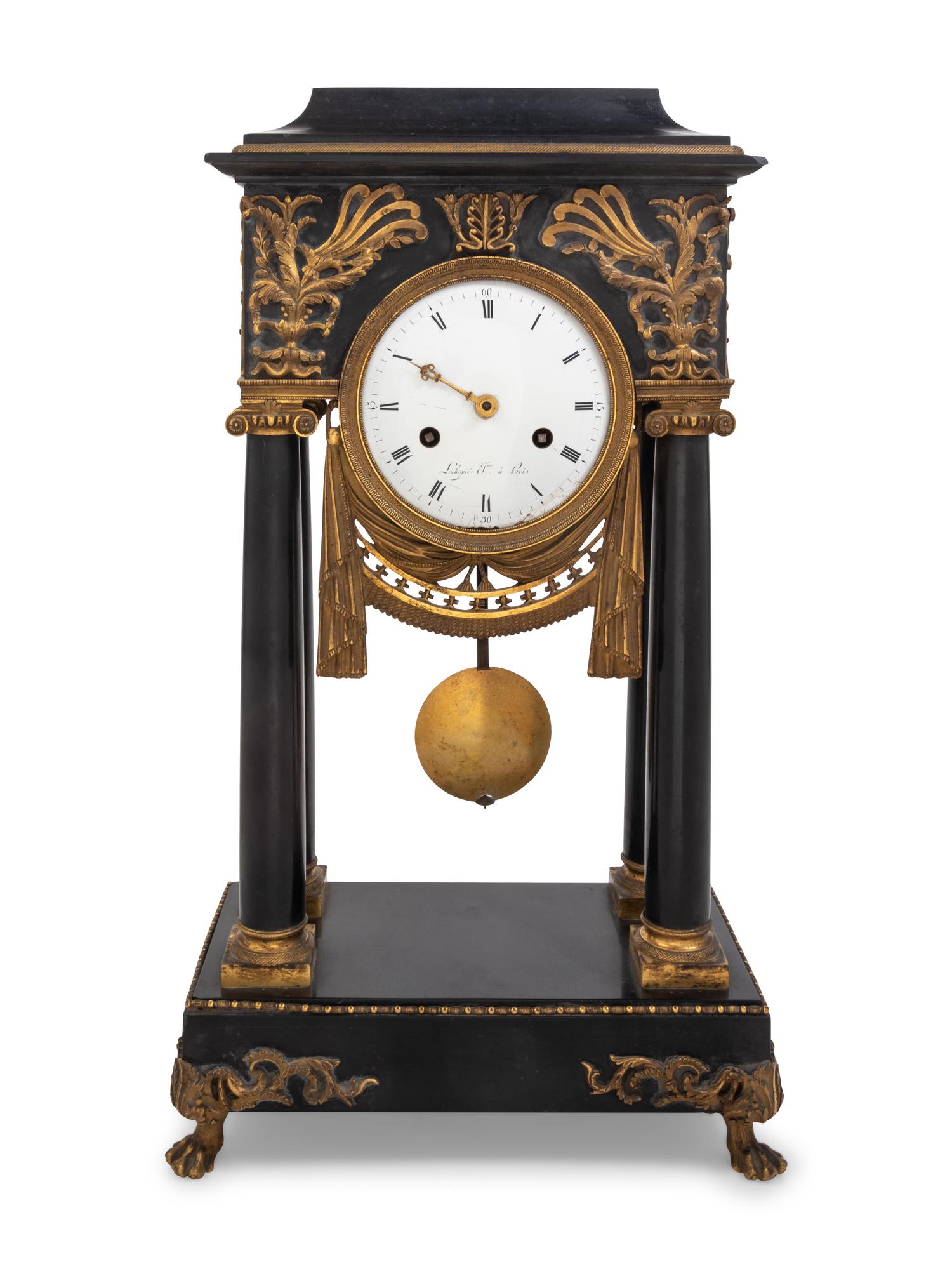 An Empire Style Gilt Metal Mounted Portico Clock