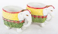 A Pair of Glazed Ceramic Elephant Form Vases Height 6 inches.