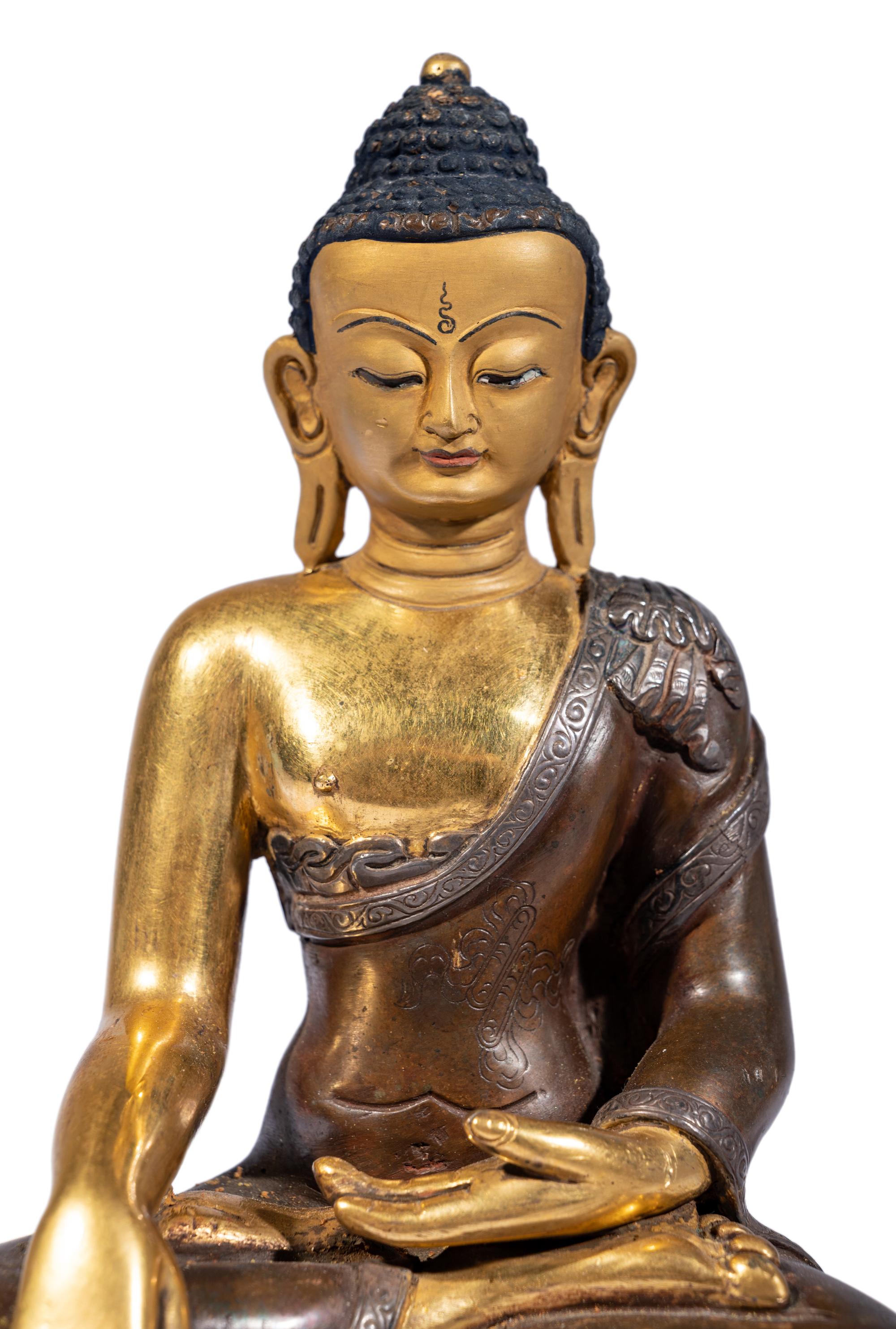 A Sino-Tibetan Gilt Bronze Figure of Buddha