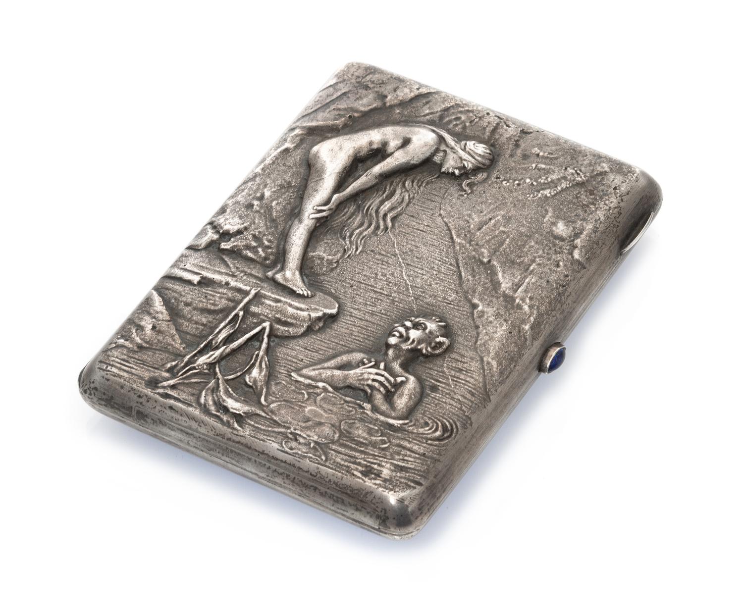 A Russian Silver Cigarette Case, Maker's mark BO, Moscow, late 19th century, the case worked to show a vodyanoy courting a nude woman,