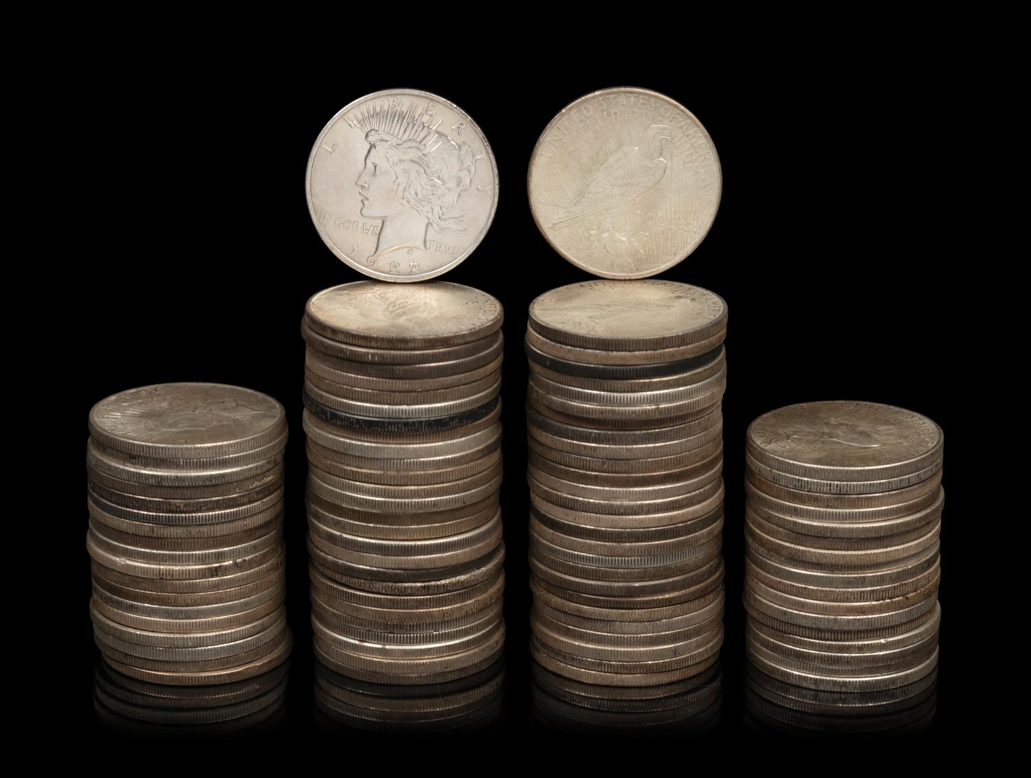 A Collection of Eighty-Nine Peace Silver $1 Coins
